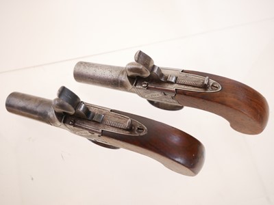 Lot Pair of percussion boxlock pistols signed H....