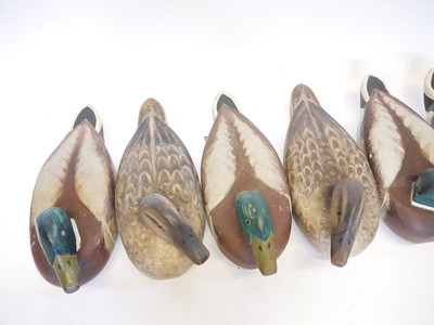 Lot 464 - Six wood decoy ducks, made originally to be a...