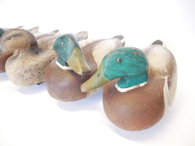 Lot 464 - Six wood decoy ducks, made originally to be a...
