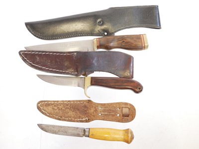 Lot 131 - Four hunting knifes, with slightly curved...