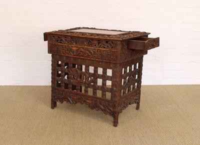 Lot 194 - A Late 19th/Early 20th Century Burmese Table with Folding Legs