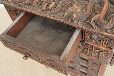 Lot 194 - A Late 19th/Early 20th Century Burmese Table with Folding Legs