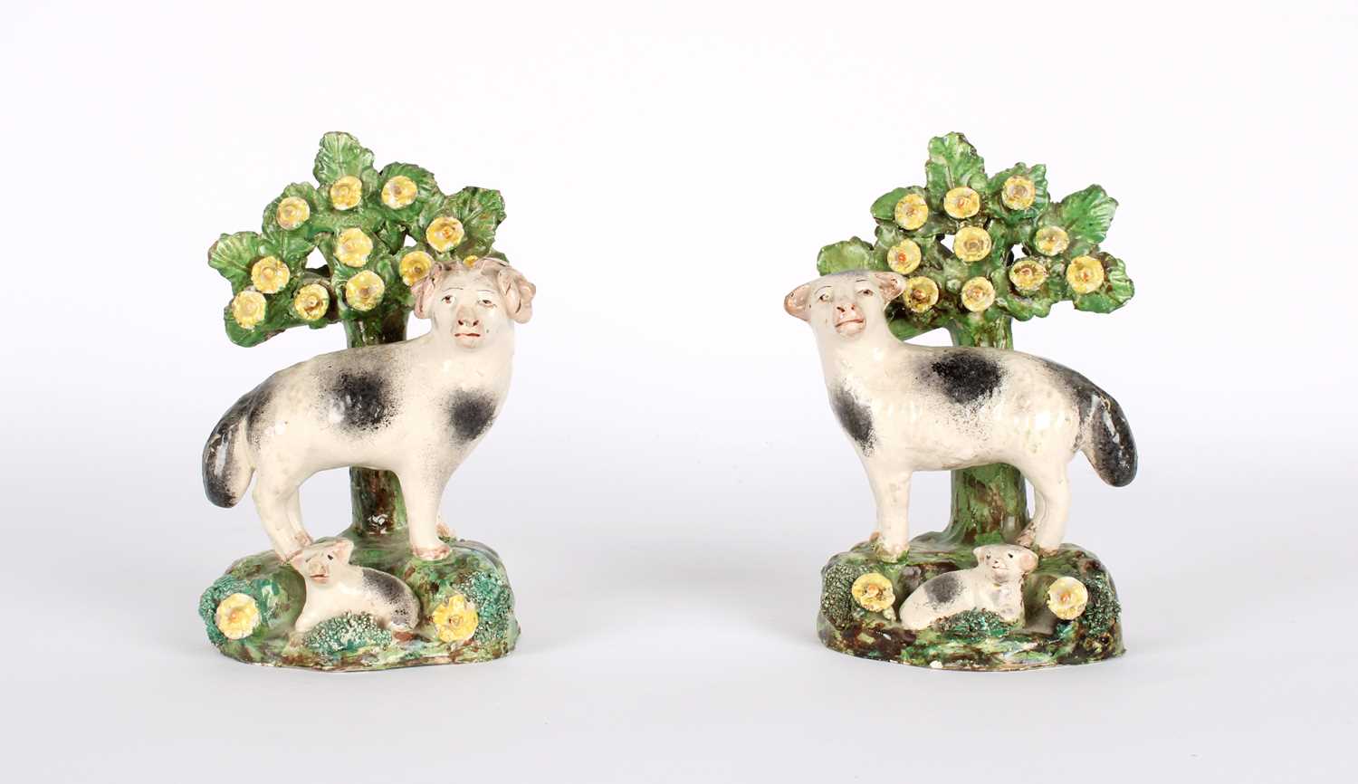 Lot 38 - A Pair of Early 19th Century 'Walton' Pearlware Sheep Figures