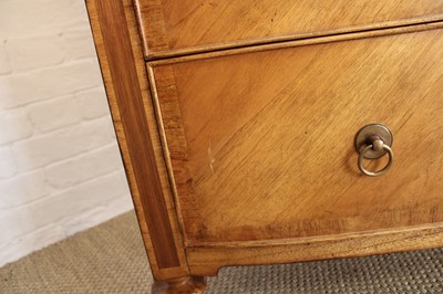 Lot 177 - A Walnut Bowfront Chest of Drawers from the "Spire" Range by Frank Hudson Ltd.