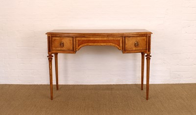 Lot 175 - A Walnut Bowfront Dressing Table, Mirror and Stool from the "Spire" Range by Frank Hudson Ltd.