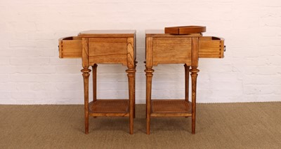 Lot 174 - A Pair of Walnut Bowfront Bedside Tables from the "Spire" Range by Frank Hudson Ltd.