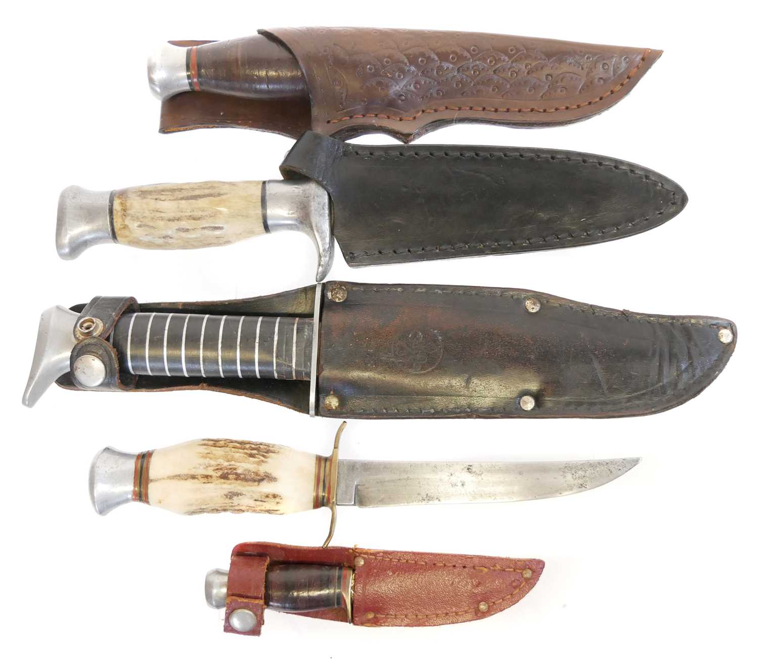 Lot 135 - Five hunting / outdoors knives, four with...