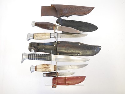 Lot 135 - Five hunting / outdoors knives, four with...