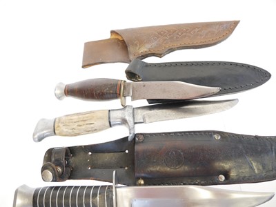 Lot 135 - Five hunting / outdoors knives, four with...