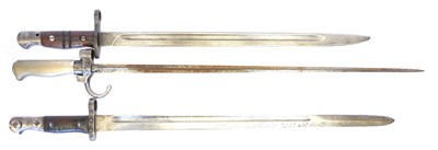 Lot Three bayonets, to include an 1886 Lebel...