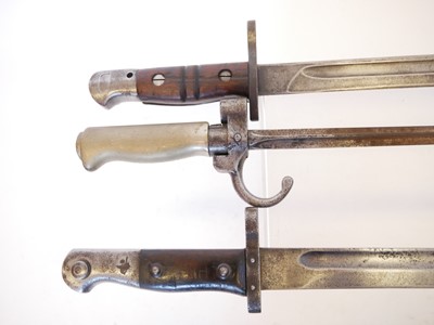 Lot 148 - Three bayonets, to include an 1886 Lebel...