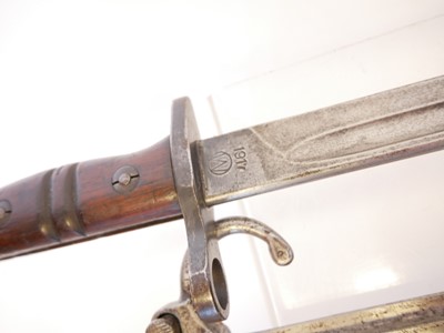 Lot 148 - Three bayonets, to include an 1886 Lebel...