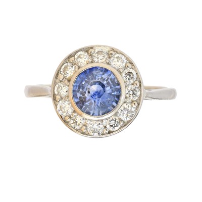 Lot A sapphire and diamond cluster ring