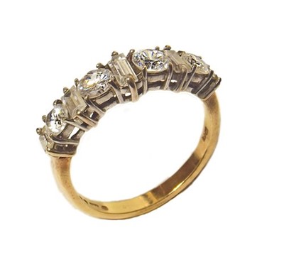 Lot A 9ct yellow gold cubic zirconia set half hoop ring