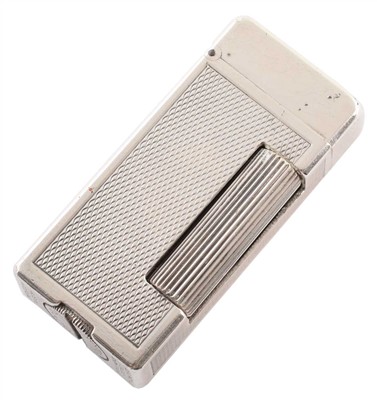 Lot A white metal Dunhill ladies lighter.