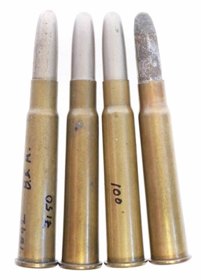 Lot 582 - Four scarce .303 black powder load cartridges,...