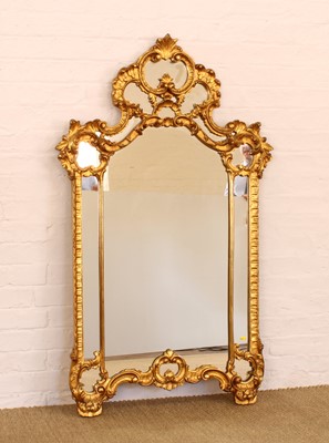 Lot 212 - A Large Reproduction Rococo Style Gilt Mirror