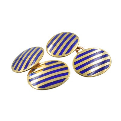 Lot 119 - A pair of 9ct gold cufflinks with blue enamel detailing