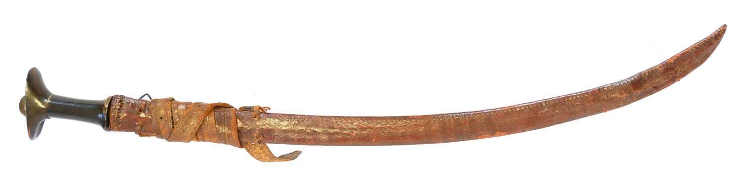 Lot Ethiopian sword and scabbard, with horn grip...