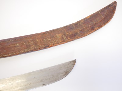 Lot Ethiopian sword and scabbard, with horn grip...