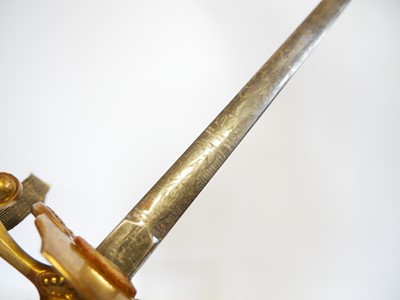 Lot Two court swords, one with the majority of the...