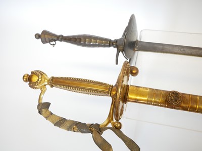 Lot Two court swords, one with the majority of the...