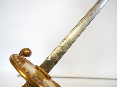 Lot Two court swords, one with the majority of the...
