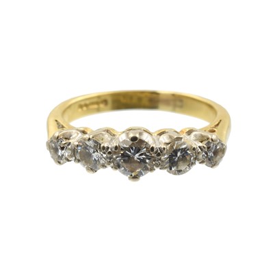 Lot An 18ct yellow gold and diamond five stone ring