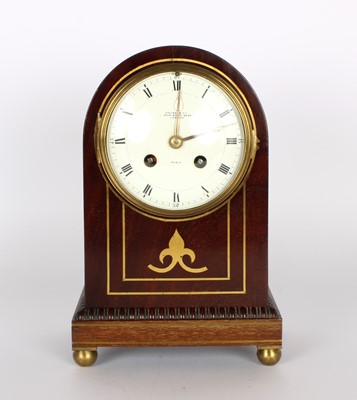 Lot 110 - A 19th Century Mahogany and Brass Strung Mantel Clock