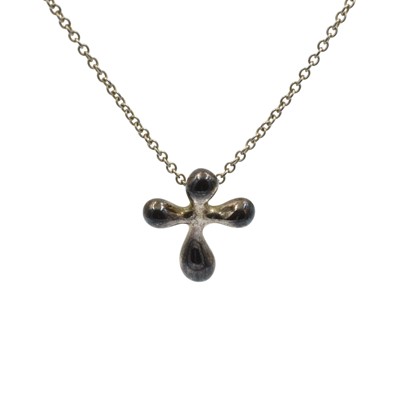 Lot A sterling silver Tiffany & Co Peretti cross pendant.