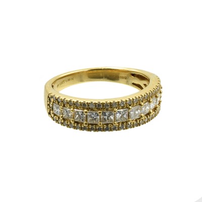 Lot A 18ct gold and diamond half eternity ring by ERNEST JONES