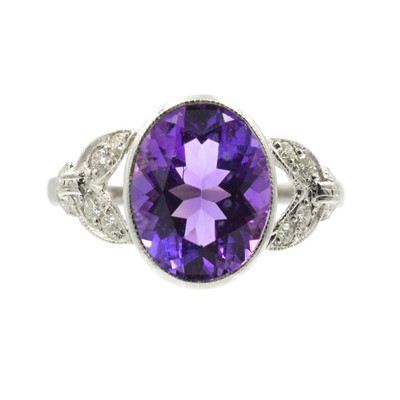 Lot An Amethyst and diamond ring set in platinum