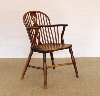 Lot 265 - A 19th Century Provincial Yew Wood Windsor Chair with Crinoline Stretcher