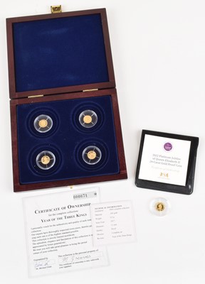 Lot 38 - Elizabeth II, Year of the Three Kings Gold Proof Coin Collection and another (5)