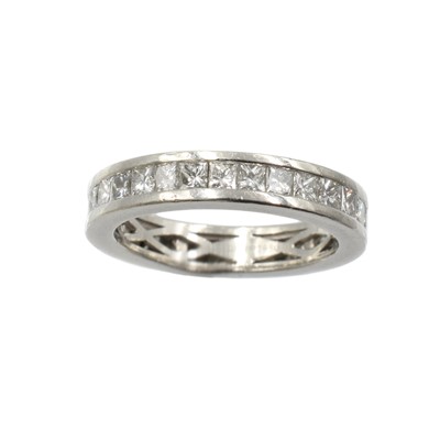 Lot 199 - A diamond and platinum eternity ring, by David Robinson