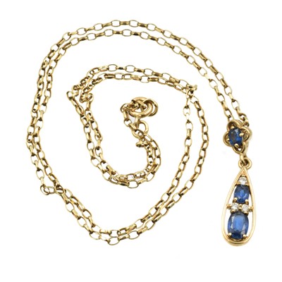 Lot A synthetic sapphire and diamond drop pendant set in 9ct gold