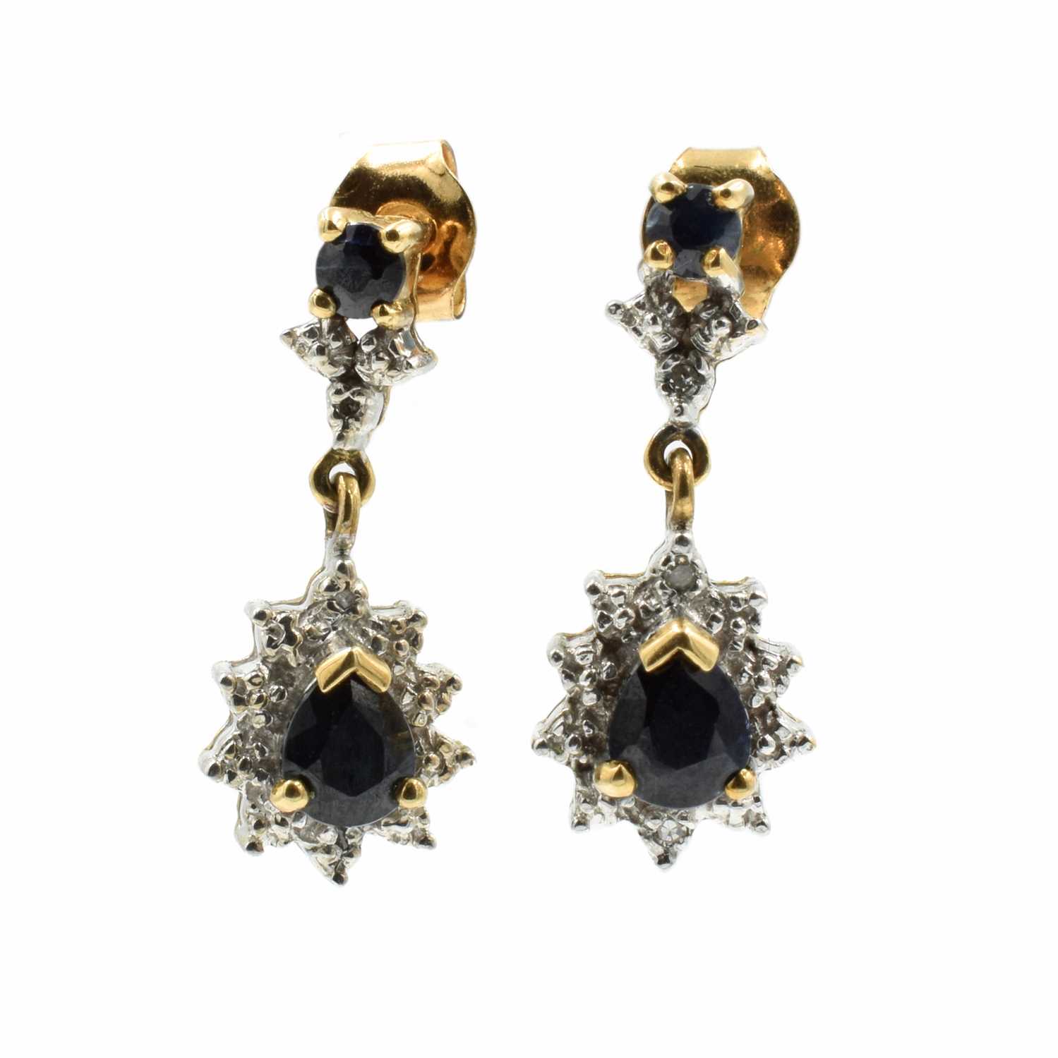 Lot 29 - Dark blue sapphire and diamond modern cluster/illusion drop earrings, set in 2-tone 9ct gold