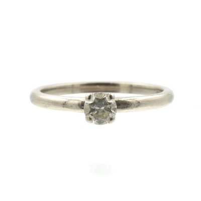 Lot An 18ct white gold and diamond solitaire ring