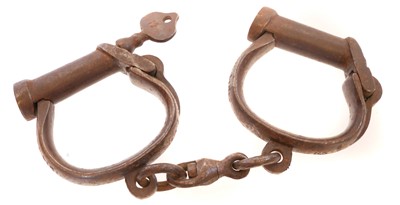 Lot Pair of WWI British handcuffs, with key,...