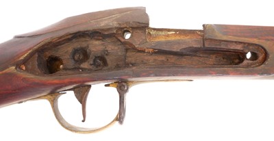 Lot Artificially aged stock and action of a 20th...