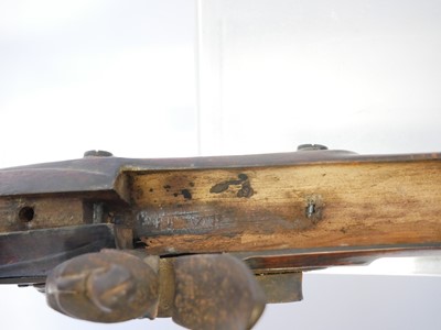 Lot Artificially aged stock and action of a 20th...