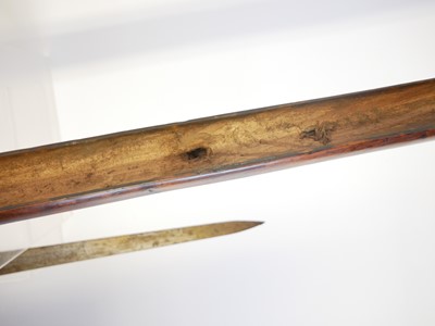 Lot Artificially aged stock and action of a 20th...