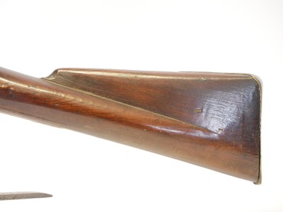 Lot Artificially aged stock and action of a 20th...