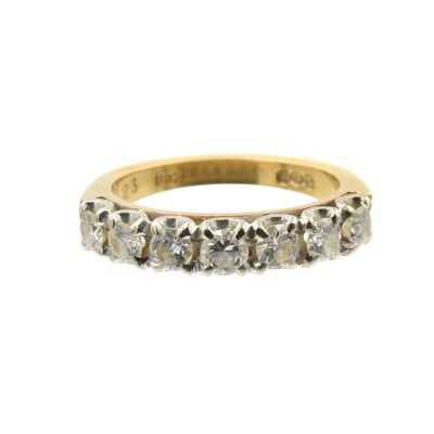 Lot A 7-stone diamond and gold half eternity ring