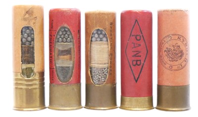 Lot Three 12 bore Window cartridges and two shop...