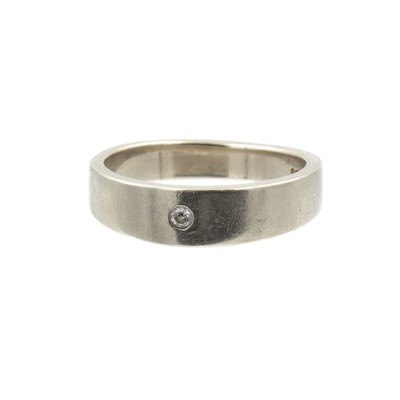 Lot 86 - An 18ct gold and diamond wedding band