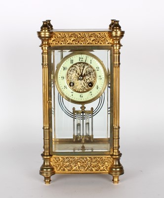 Lot 107 - A Late 19th Century French Gilt Brass and Four Glass 'Skeleton' Mantel Clock