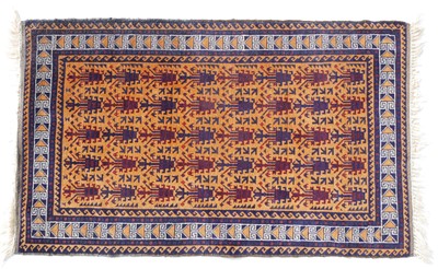 Lot 230 - A Tribal Rug