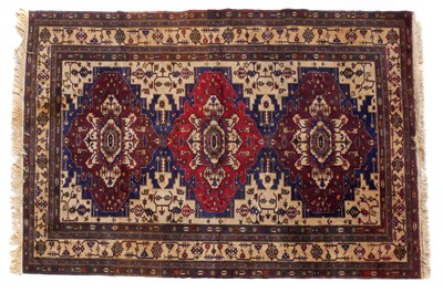 Lot 213 - An Afghan Kazak Rug