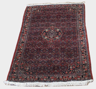 Lot 235 - A Persian Kashan Rug